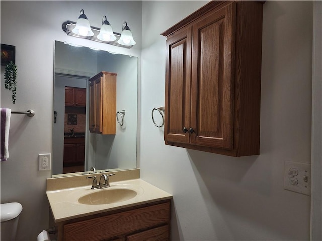 8 Courtyard Blvd, Sullivan, IL 61951 - bathroom featuring toilet and vanity