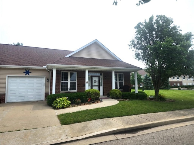 8 Courtyard Blvd, Sullivan, IL 61951 - view of front of house featuring a garage, brick siding, driveway, a front yard, and roof with shingles