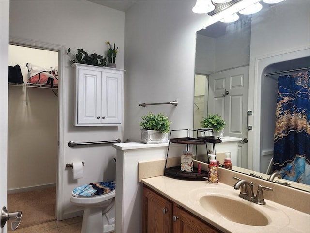8 Courtyard Blvd, Sullivan, IL 61951 - full bath with vanity, toilet, tile patterned floors, and a shower with shower curtain