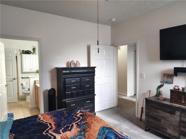 8 Courtyard Blvd, Sullivan, IL 61951 - bedroom featuring ensuite bathroom and baseboards