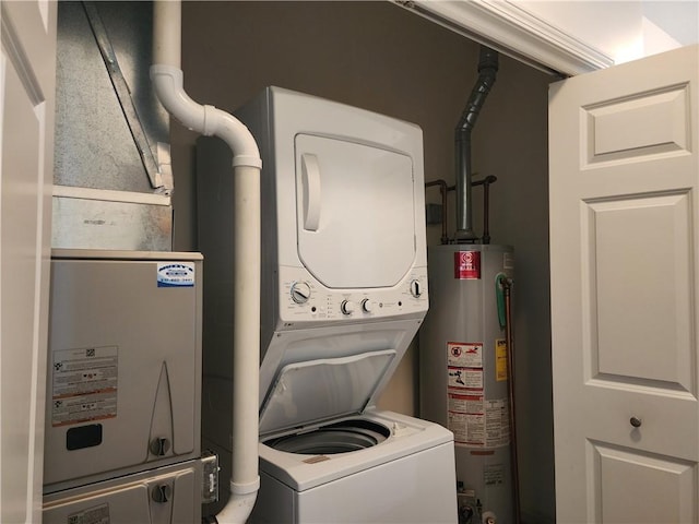 8 Courtyard Blvd, Sullivan, IL 61951 - washroom with stacked washing machine and dryer and gas water heater