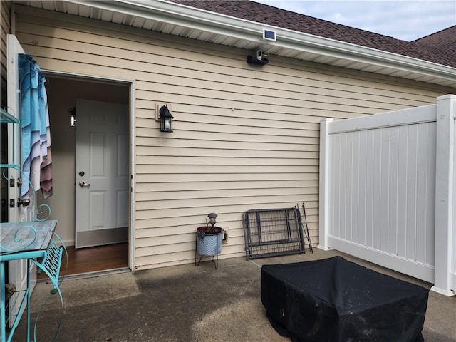 8 Courtyard Blvd, Sullivan, IL 61951 - doorway to property featuring roof with shingles