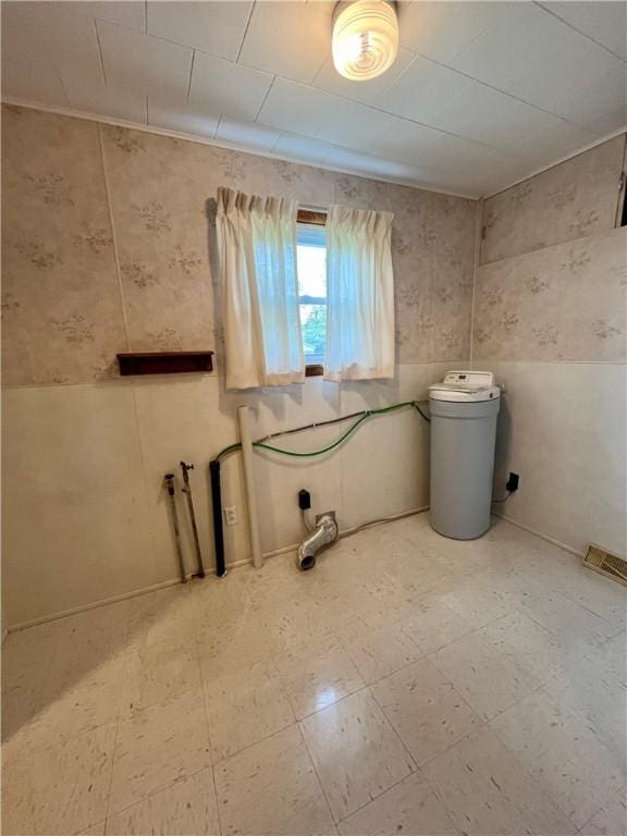 clothes washing area featuring laundry area