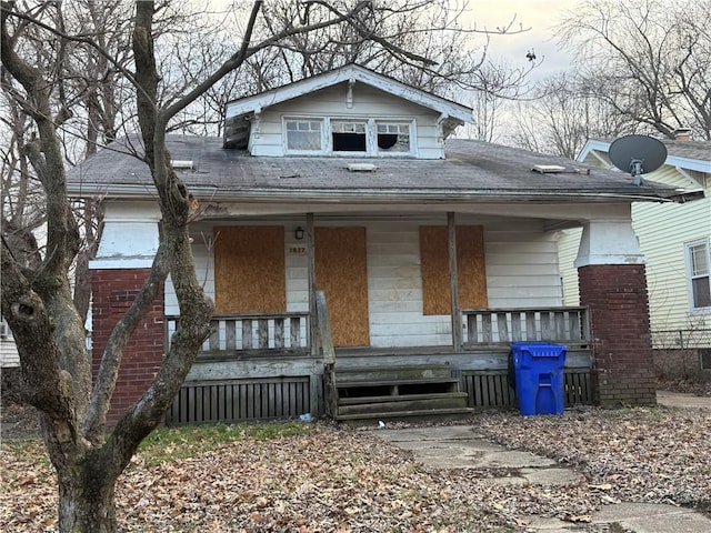 bungalow-style house featuring a porch