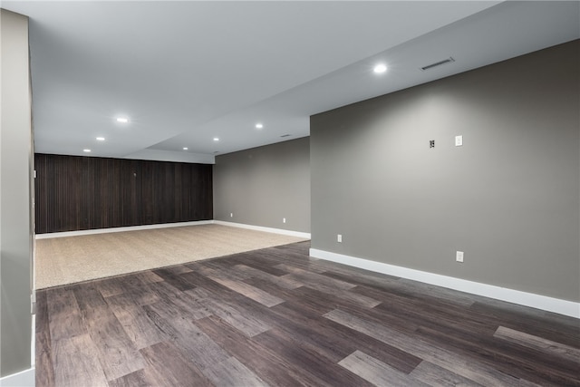 unfurnished room with hardwood / wood-style flooring