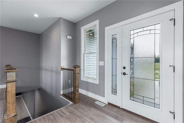 entrance foyer featuring hardwood / wood-style flooring