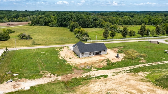 birds eye view of property featuring a rural view