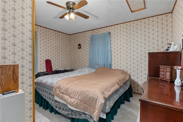 carpeted bedroom featuring a textured ceiling, ceiling fan, and crown molding