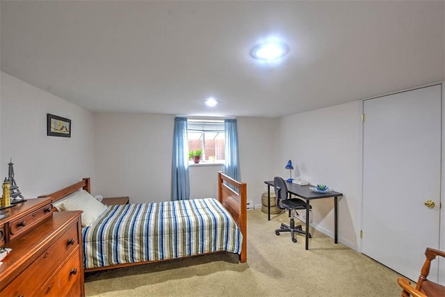 bedroom with light carpet