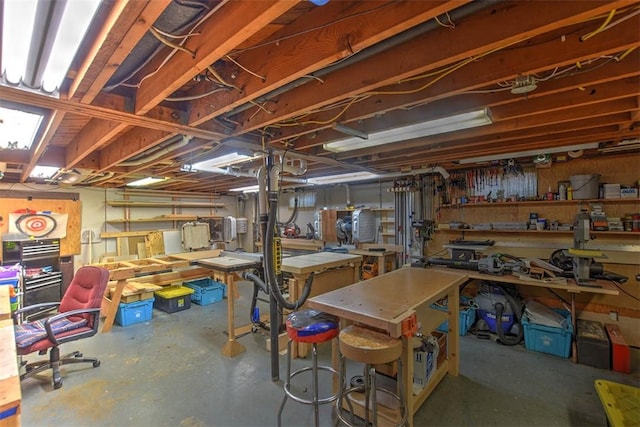 basement with a workshop area