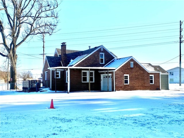 view of snow covered property