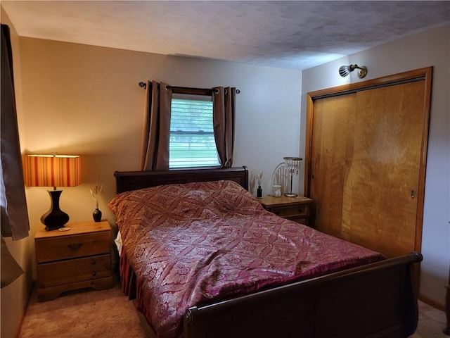 505 W N 9th St, Shelbyville, IL 62565 - carpeted bedroom featuring a closet and a textured ceiling