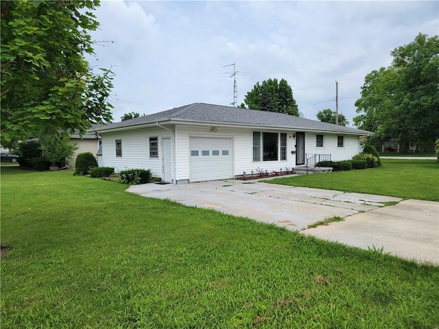 505 W N 9th St, Shelbyville, IL 62565 - ranch-style house with a garage, concrete driveway, and a front yard