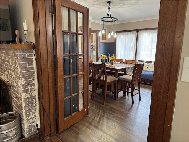 1007 10th St, Charleston, IL 61920 - dining space featuring ornamental molding and wood finished floors