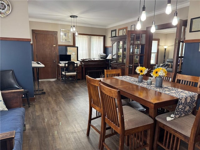 1007 10th St, Charleston, IL 61920 - dining area featuring dark wood-style floors and crown molding