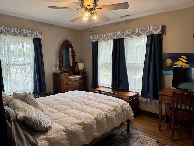 1007 10th St, Charleston, IL 61920 - bedroom with wood finished floors and ceiling fan