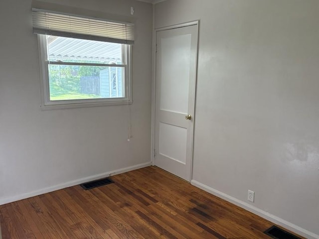 1216 Lawn Dr, Mattoon, IL 61938 - unfurnished room with wood finished floors