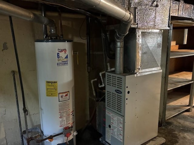 1216 Lawn Dr, Mattoon, IL 61938 - utility room featuring gas water heater and heating unit