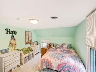 525 N 7th St, Charleston, IL 61920 - carpeted bedroom with lofted ceiling