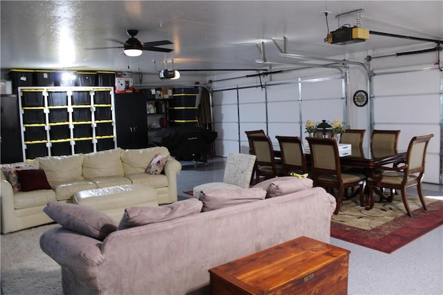 garage featuring a garage door opener and a ceiling fan