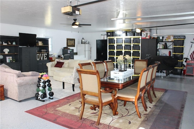 dining room featuring speckled floor and a ceiling fan