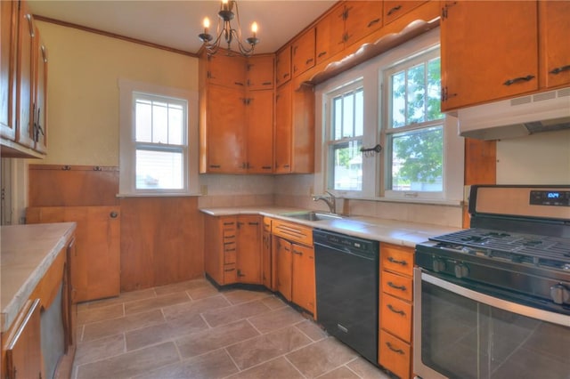 1416 W Decatur St, Decatur, IL 62522 - kitchen with black dishwasher, stainless steel gas stove, a sink, under cabinet range hood, and brown cabinets