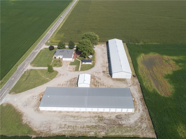 birds eye view of property featuring a rural view