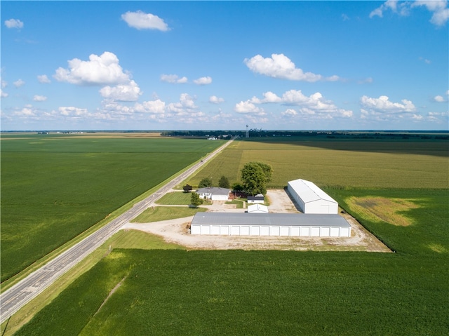 birds eye view of property with a rural view