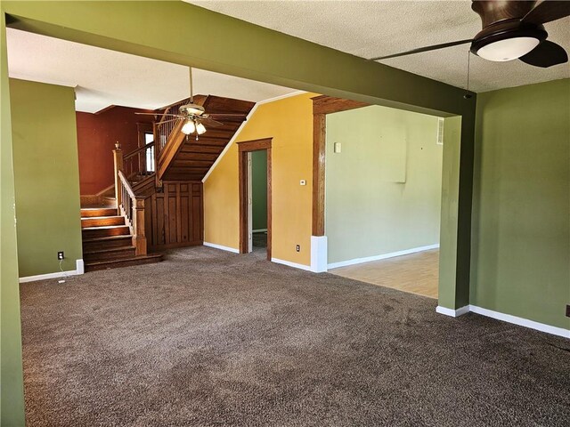 301 S Meridian St, Toledo, IL 62468 - unfurnished living room with ceiling fan, carpet, and stairs