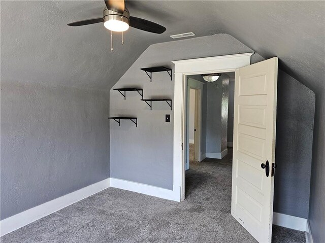 301 S Meridian St, Toledo, IL 62468 - additional living space with a ceiling fan, vaulted ceiling, and carpet floors