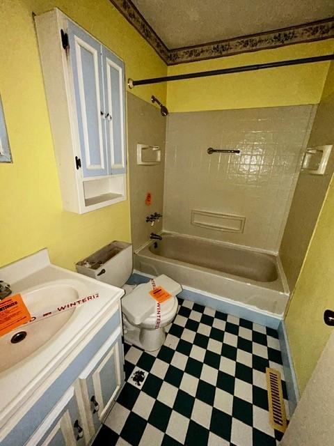 1010 N Summit Ave, Decatur, IL 62522 - bathroom with tile patterned floors, vanity, and shower / bathtub combination