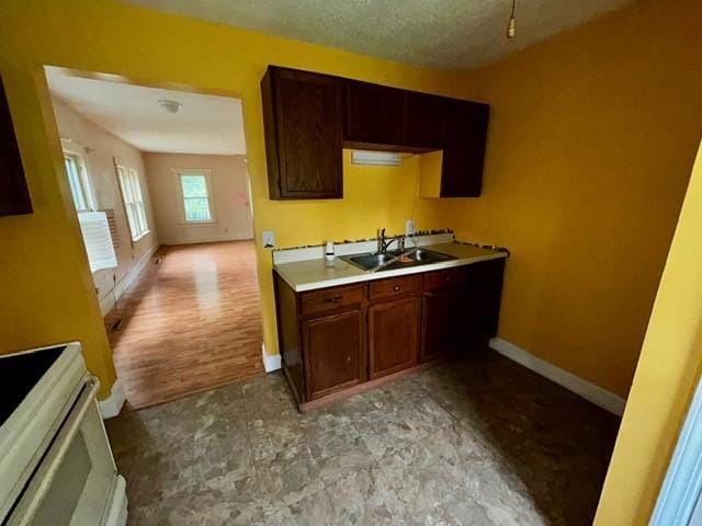 1010 N Summit Ave, Decatur, IL 62522 - kitchen with white stove and light countertops