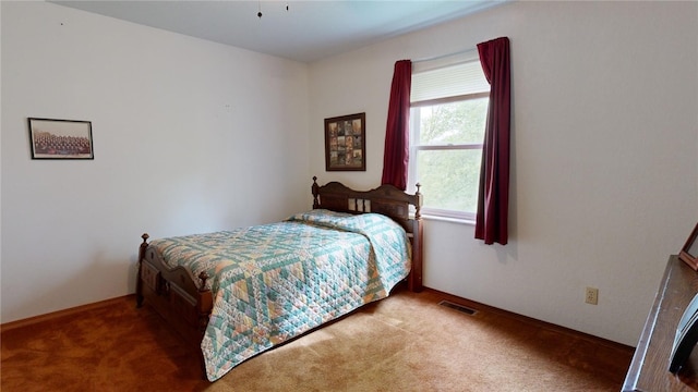 bedroom featuring carpet flooring