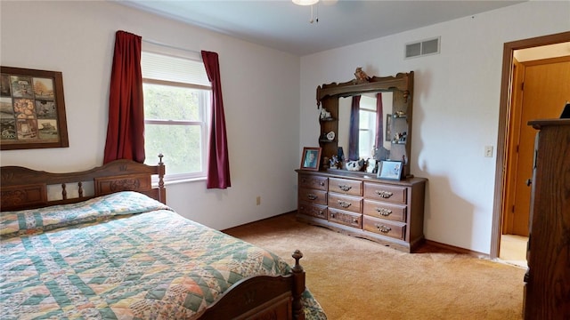 bedroom with light carpet