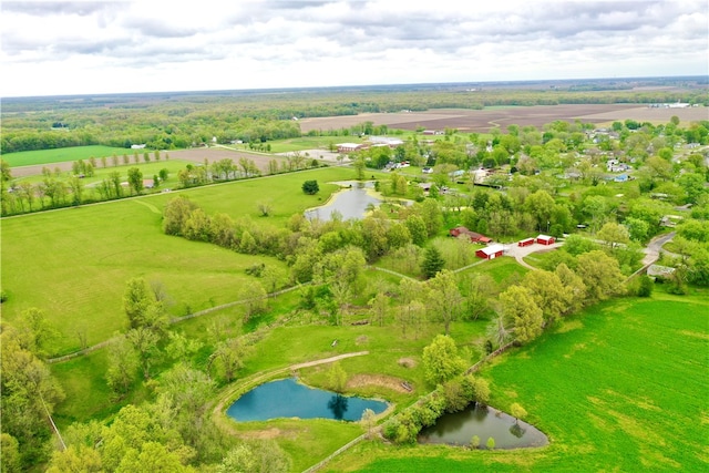 aerial view with a water view and a rural view