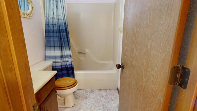 full bathroom featuring vanity, toilet, and shower / bathtub combination with curtain