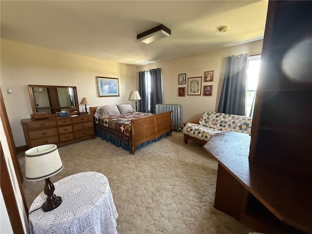 27288 State Highway 16, Ashmore, IL 61912 - bedroom featuring radiator heating unit and light carpet