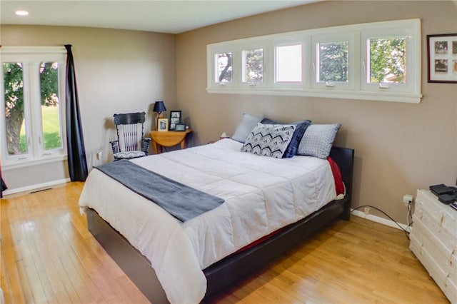 400 Country Club Rd, Mattoon, IL 61938 - bedroom featuring light wood-style flooring and recessed lighting