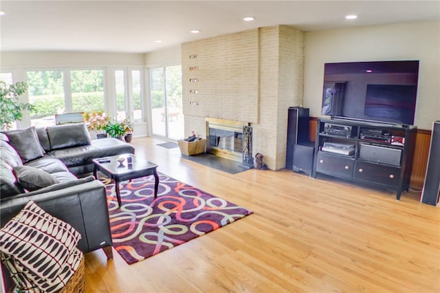 400 Country Club Rd, Mattoon, IL 61938 - living room featuring wood finished floors, a fireplace, and recessed lighting