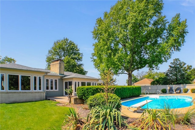400 Country Club Rd, Mattoon, IL 61938 - view of swimming pool featuring a diving board and a patio area