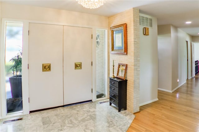 400 Country Club Rd, Mattoon, IL 61938 - foyer with a chandelier, light wood finished floors, and recessed lighting
