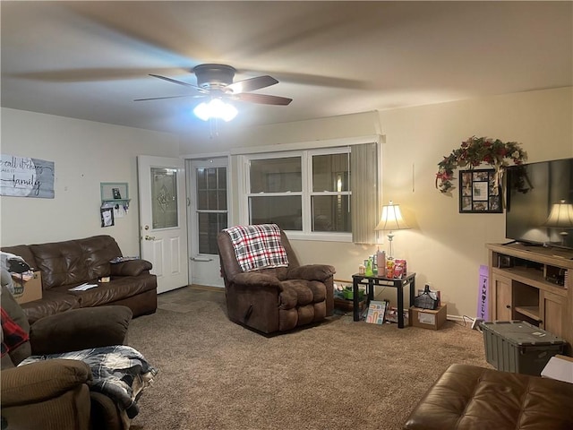 living room with carpet floors and ceiling fan