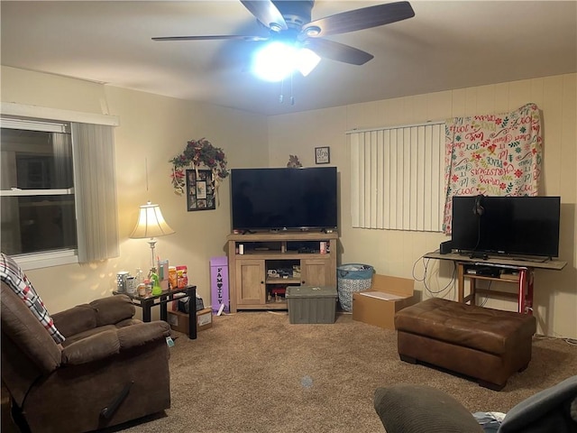 living room featuring carpet floors and ceiling fan