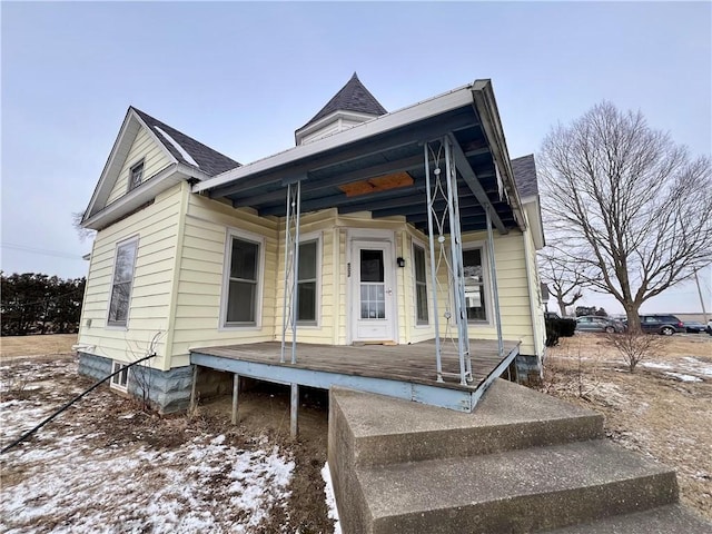 view of front of house with roof with shingles