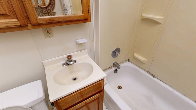 full bathroom featuring vanity, shower / bathing tub combination, and toilet
