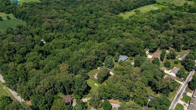 18058 E 1545th Ave, Teutopolis, IL 62467 - aerial view of property and surrounding area featuring a heavily wooded area