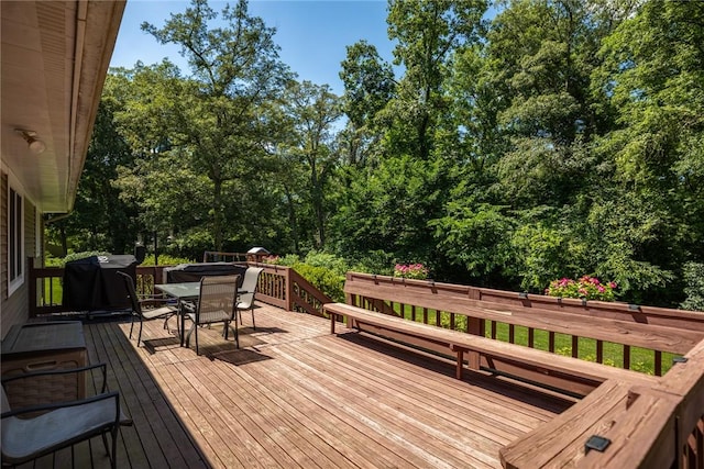 18058 E 1545th Ave, Teutopolis, IL 62467 - wooden deck with outdoor dining area, area for grilling, and view of scattered trees
