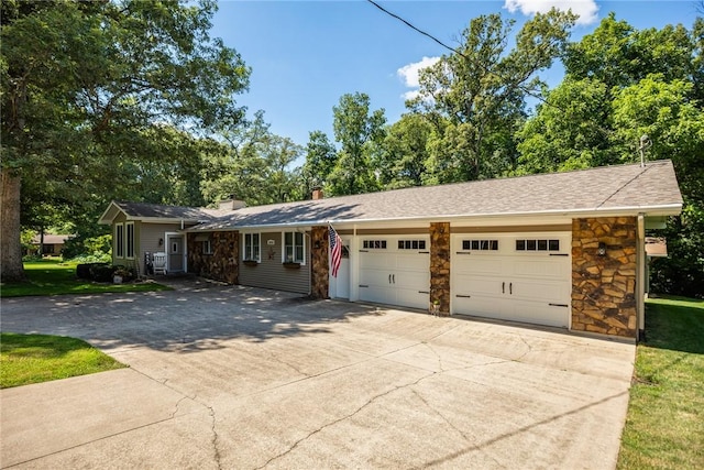 18058 E 1545th Ave, Teutopolis, IL 62467 - ranch-style house with concrete driveway, a garage, stone siding, and a chimney