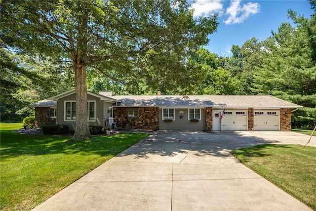 18058 E 1545th Ave, Teutopolis, IL 62467 - view of front facade featuring concrete driveway, an attached garage, a front yard, and stone siding