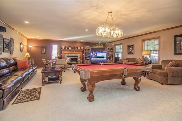 recreation room with recessed lighting, ornamental molding, pool table, a glass covered fireplace, and carpet flooring